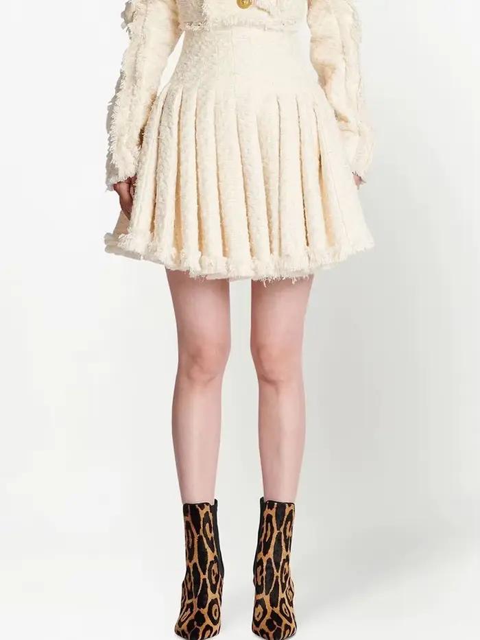 HIGH STREET Nouvelle Collection Mode Automne/Hiver 2026 Jupe Plissée en Tweed à Franges et Pompons p