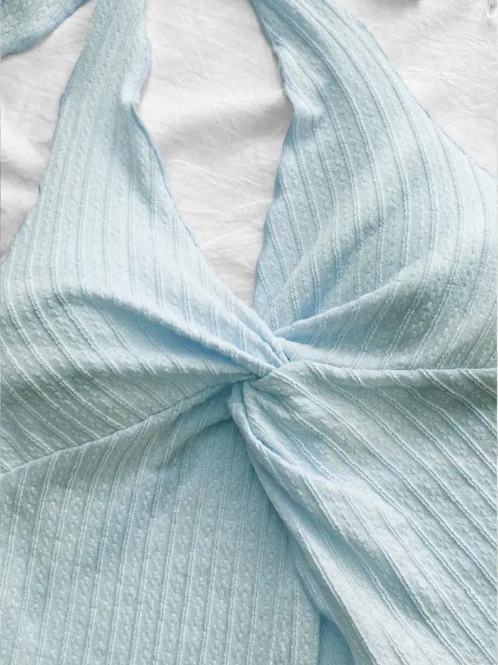 Haut extensible pour femme en maille côtelée