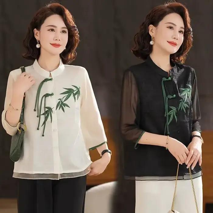 Chemise de style chinois pour femmes, crème blanche, avec broderie de bambou vert, bouton de grenouille, manches courtes, haut ample pour les femmes d'âge moyen