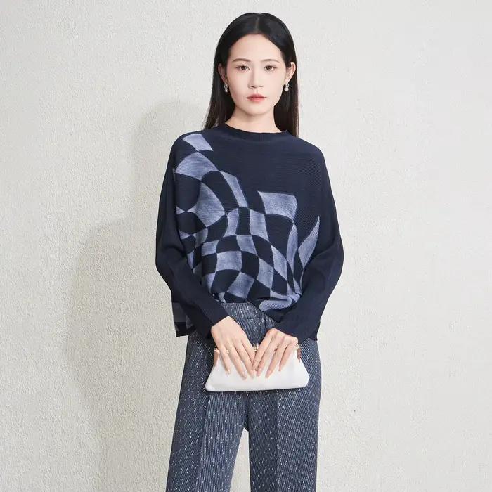 2025 chemisier femme automne hiver nouveau col rond ample manches chauve-souris artistique imprimé géométrique pull en