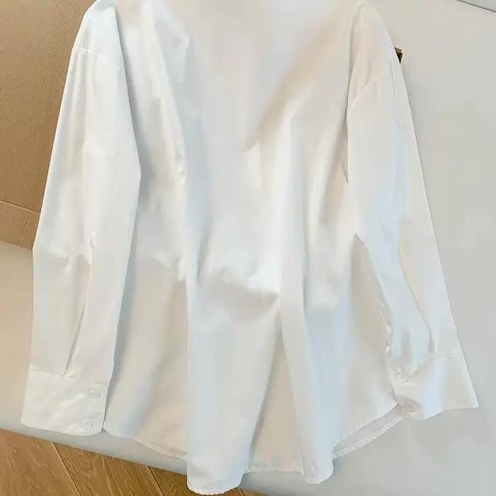 Chemisier blanc à col rabattu pour femme