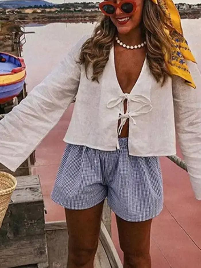 Chemises blanches à lacets pour femmes