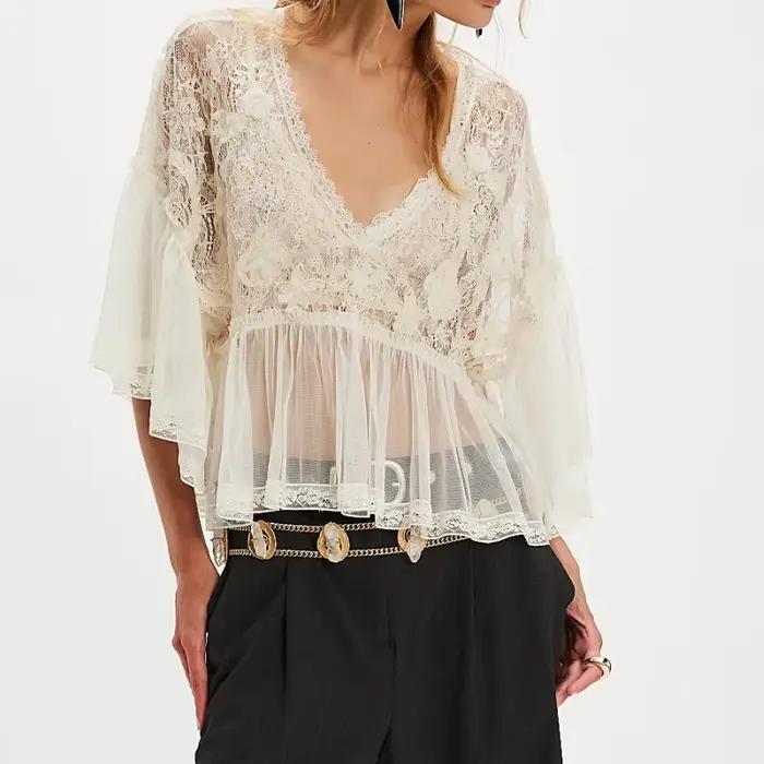 Chemisier en dentelle transparente pour femme