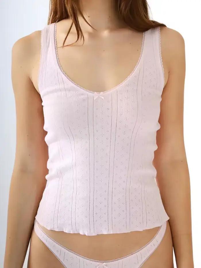 Haut dos nu en dentelle rose et blanche à col en V