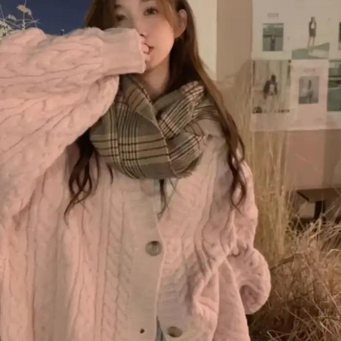 Pull torsadé rose pour femme