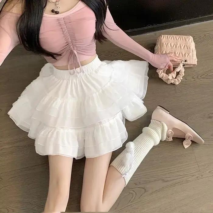 Nouveau dans les vêtements doux coréen décontracté été tendance blanc dentelle gâteau Mini jupe Ball