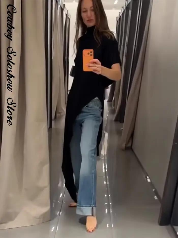 Haut asymétrique noir unique pour femme