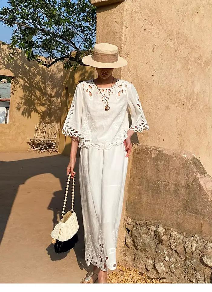 Nouvelle Blouse Bohème Broderie Style Français Femme Manches Évasées Blanche Ample Évidée Décontractée Été Sexy Vacances Hauts Féminins