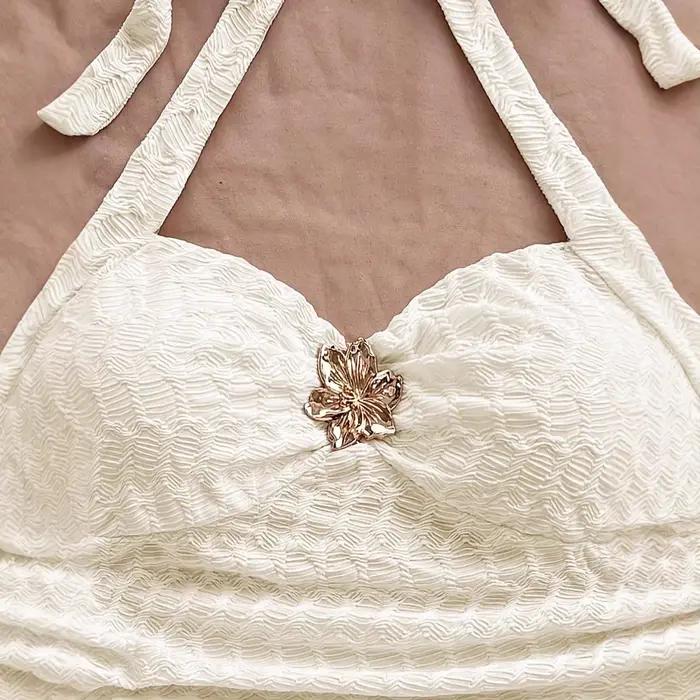 Haut court en tricot texturé blanc cassé pour femme
