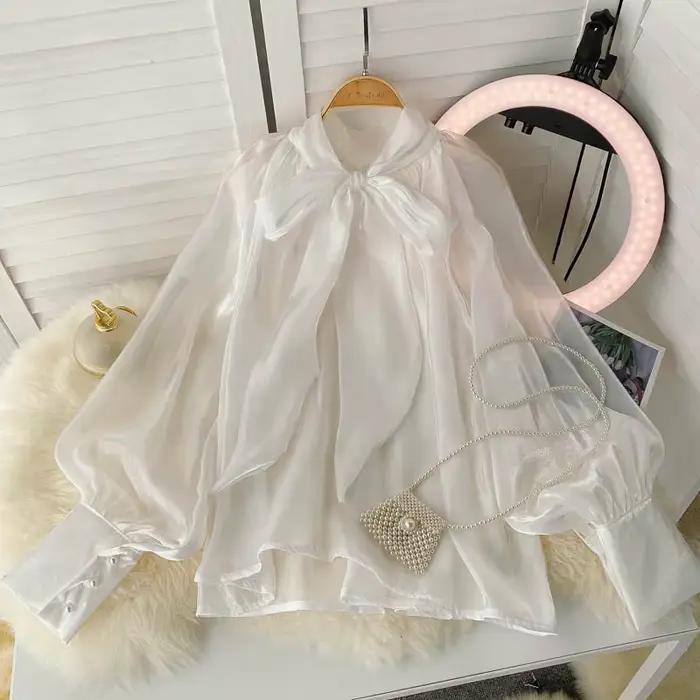 Été printemps France couleur unie chemises concepteur volants cou lanterne manches femmes Blouses nœud papillon soyeux élégant haut tempérament